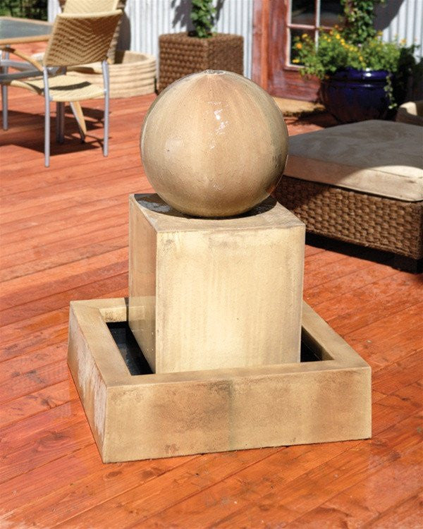Garden water feature with block and sphere design
