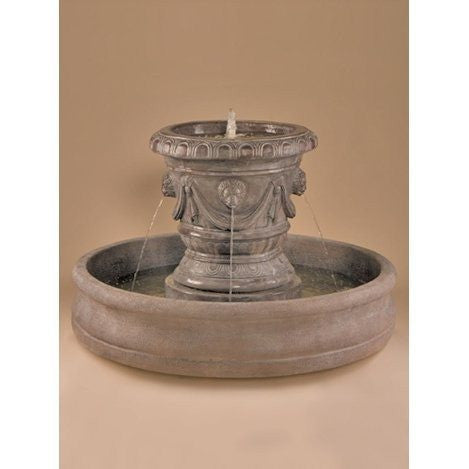 Outdoor fountain featuring a classico pot design with lion heads