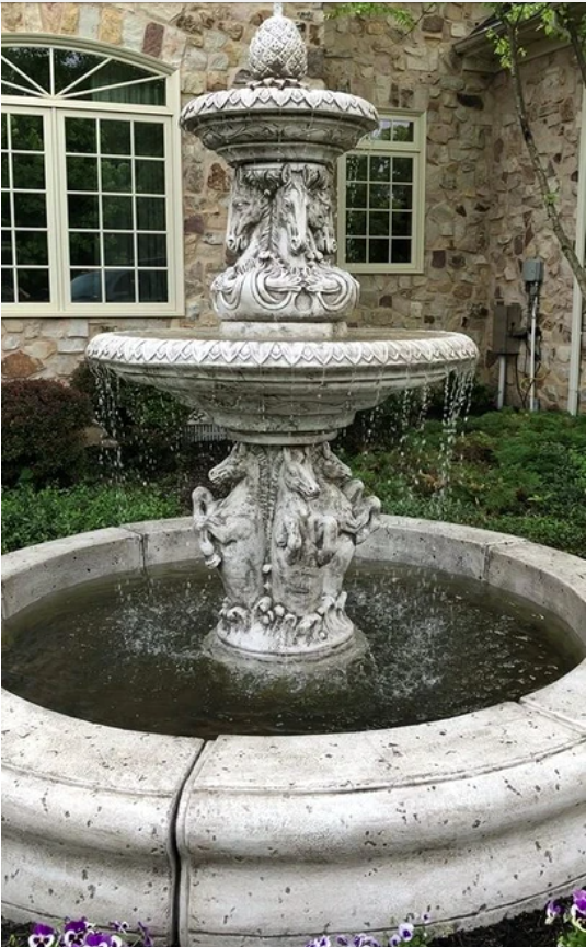 Outdoor fountain with pond feature