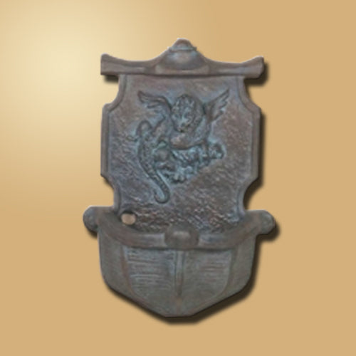 Decorative wall fountain featuring a dragon design