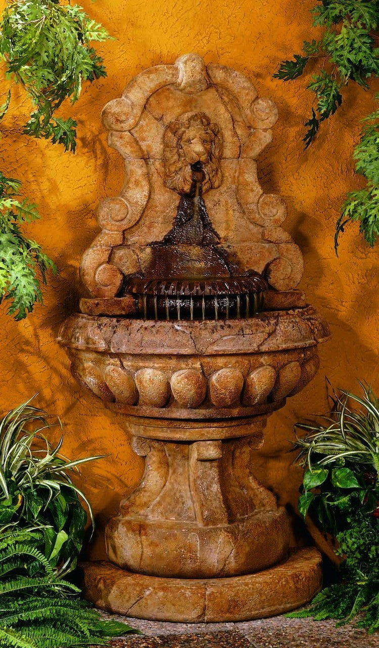 Outdoor wall fountain with lion head design