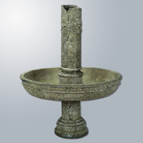 Outdoor water fountain featuring a green man ruin design