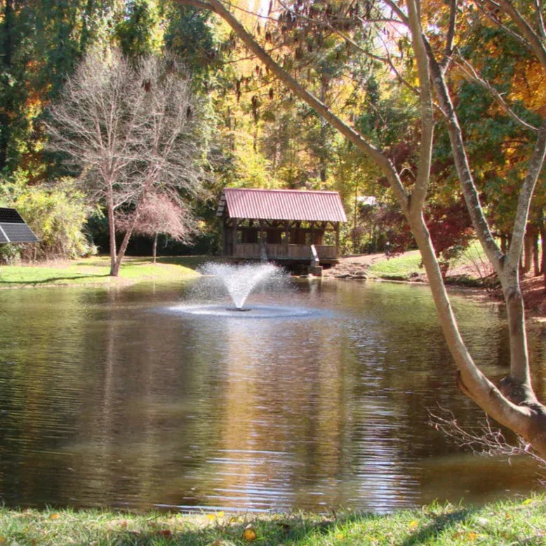Image of a solar powered pond aerator with four solar panels.