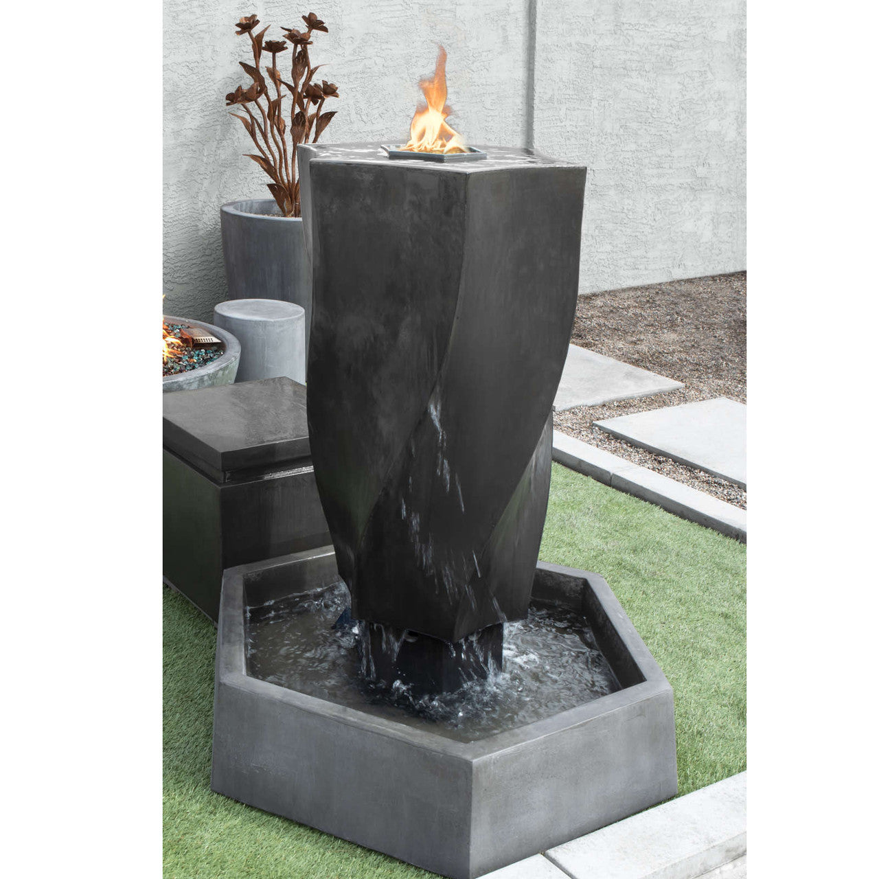 Image of a fountain creating a vortex effect with fire.