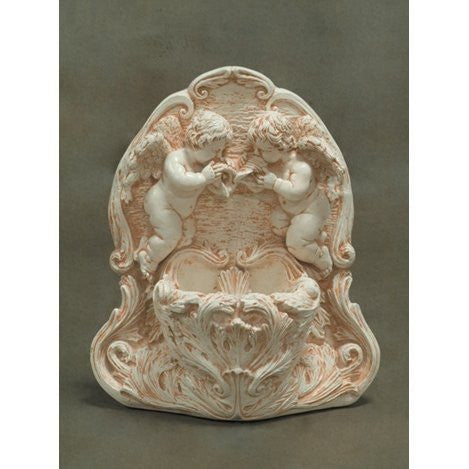 Outdoor wall fountain featuring an angel design