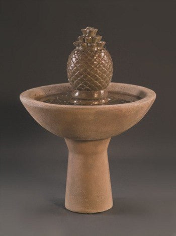 Small water fountain featuring a pineapple design