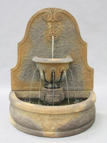 Outdoor wall fountain made of cast stone