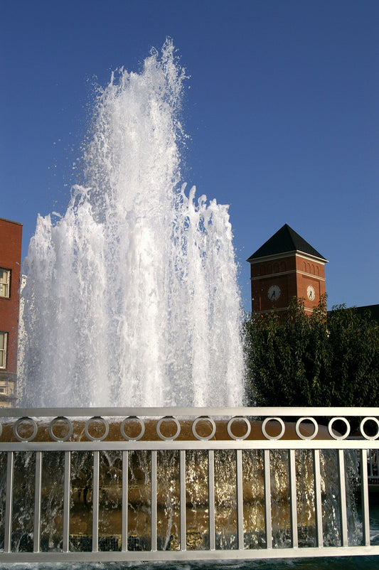a water fountain in front of a building