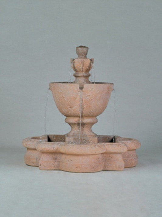 Outdoor tiered fountain in a quatrefoil shaped basin