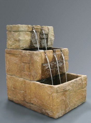 Outdoor wall fountain with cascading water feature for a stone courtyard