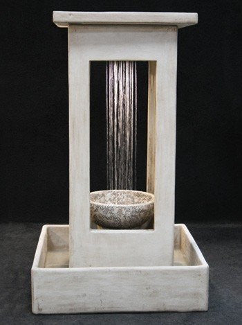 Outdoor fountain with smooth center rain effect, bowl, and square basin
