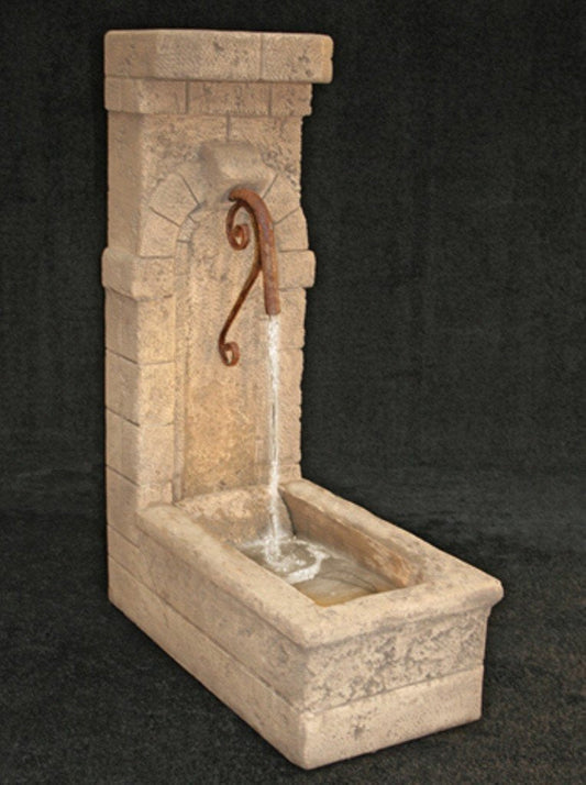 Outdoor wall fountain with water well design