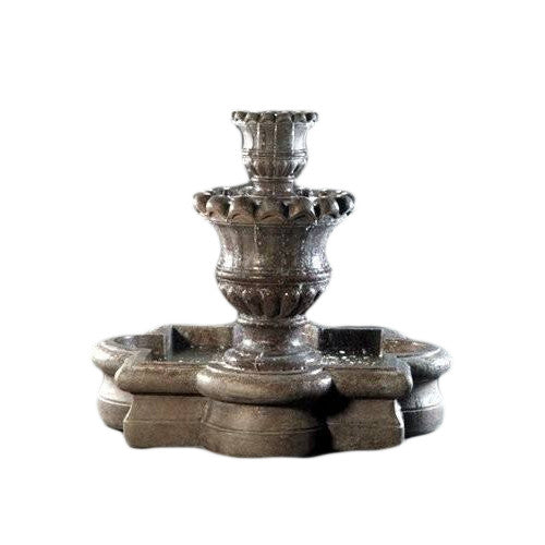 Outdoor fountain featuring a scallop urn and quatrefoil basin
