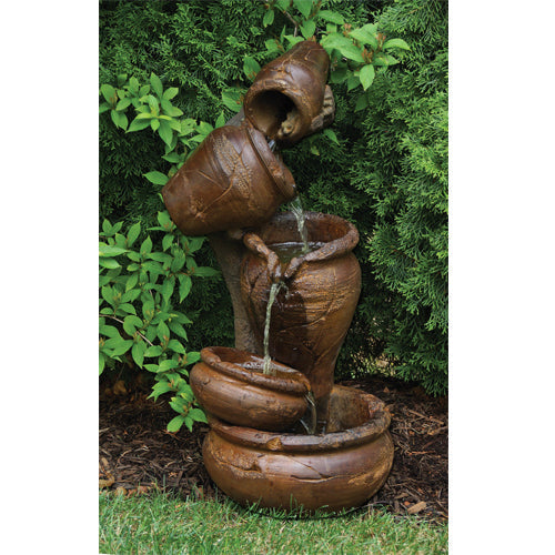 Garden fountain with a juggling design