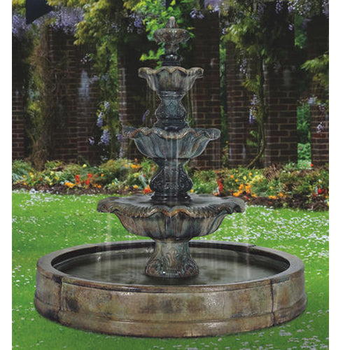 Image of a large outdoor water feature with three levels, designed in a classic style.
