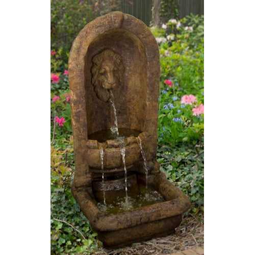 Image of a lion head alcove fountain.