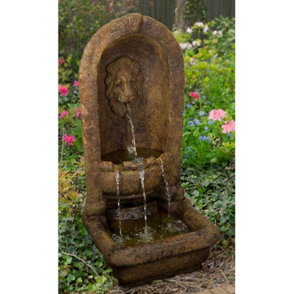 Image of a lion head alcove fountain.