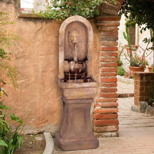Image of a tall alcove fountain featuring a lion design.