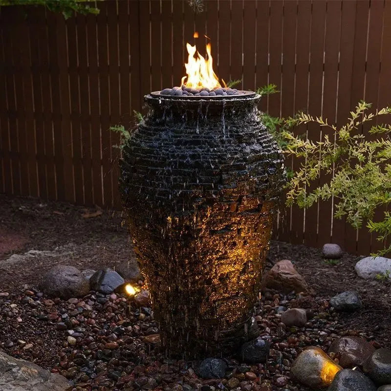 Large stacked slate urn water feature with fire element