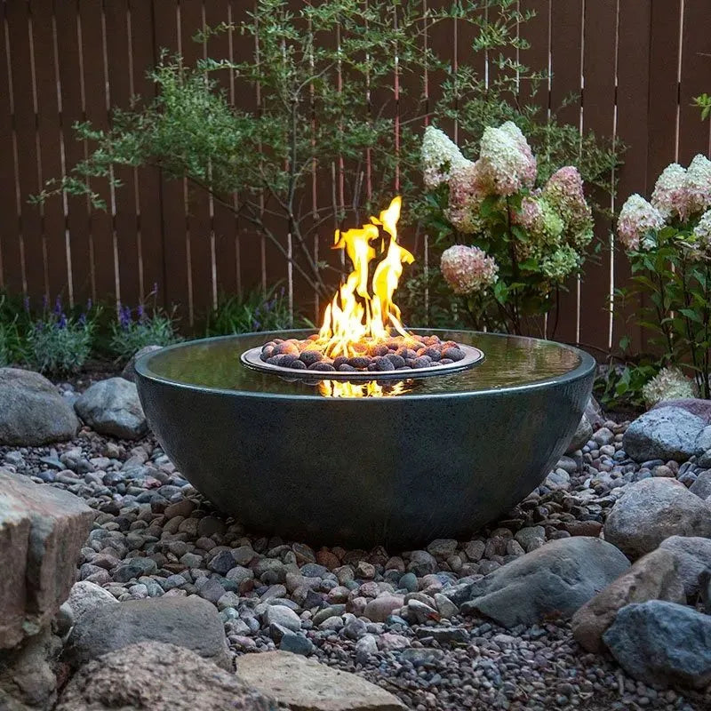 Outdoor water feature basin with fire element