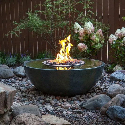 Outdoor water feature basin with fire element