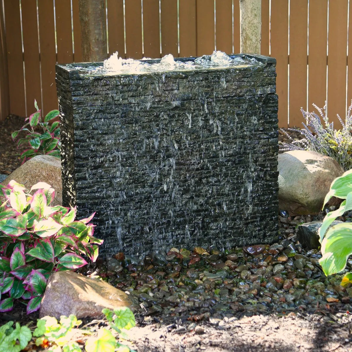 Stacked slate wall base measuring 26 inches high