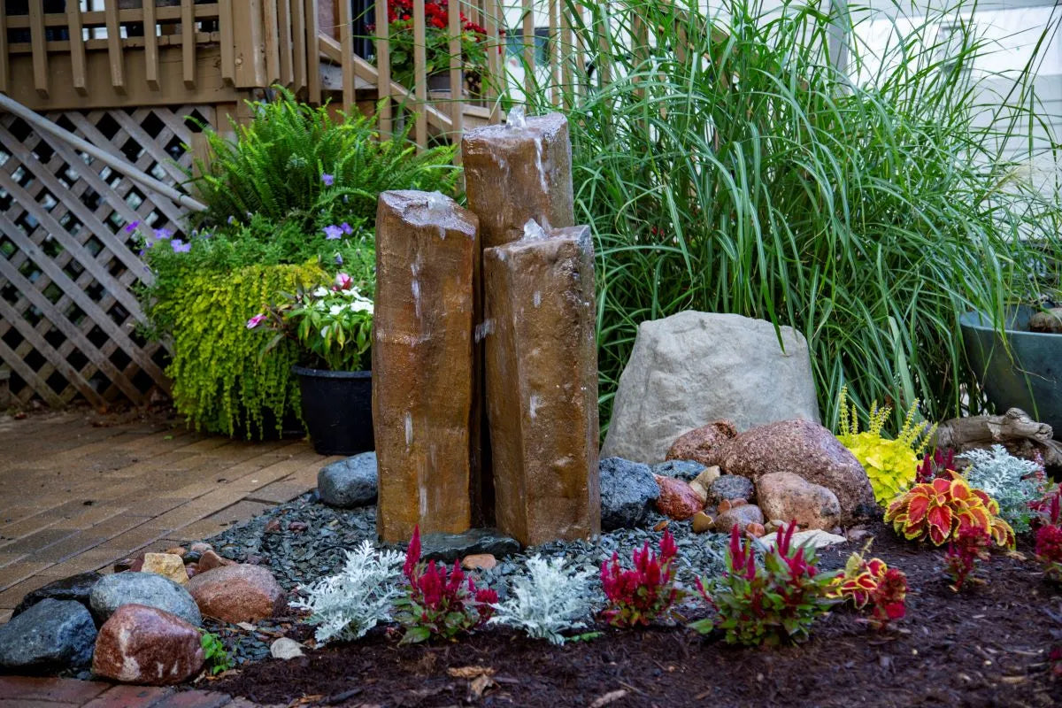 Set of three decorative faux basalt columns