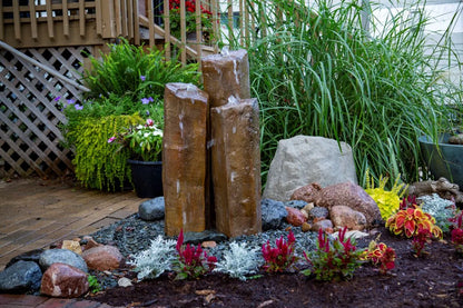Set of three decorative faux basalt columns