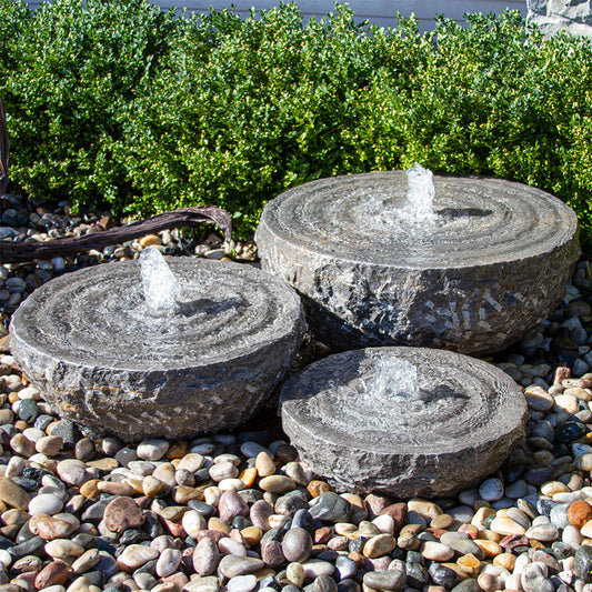 Image of a natural stone bowl with a swirl fountain feature