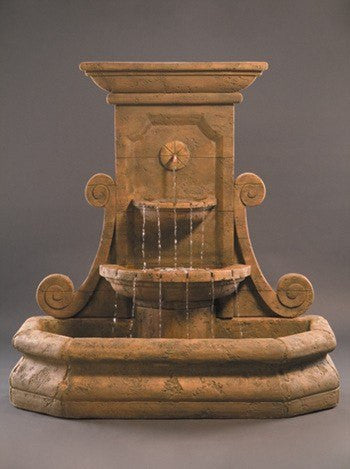 Outdoor wall fountain with large volute design