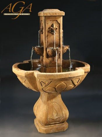 Outdoor water fountain with fleur de lis design
