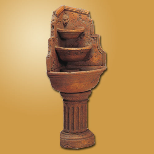 Outdoor water fountain designed for a corner space