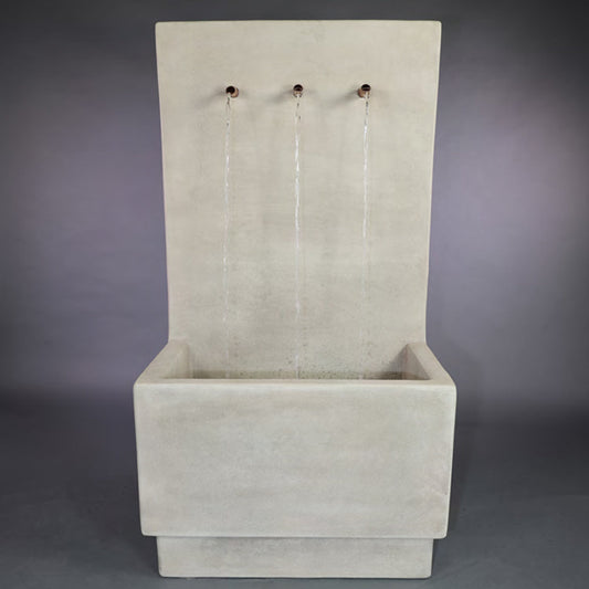 Outdoor wall fountain with water flowing