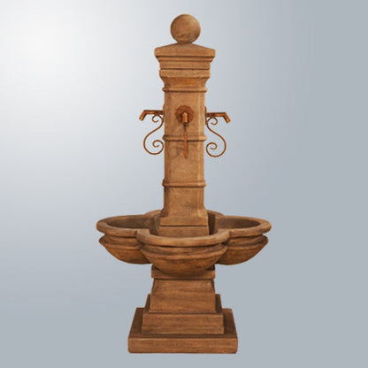 Image of a courtyard fountain with rustic iron spouts