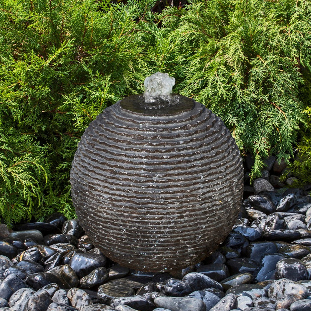 Ribbed granite sphere fountain in black finish