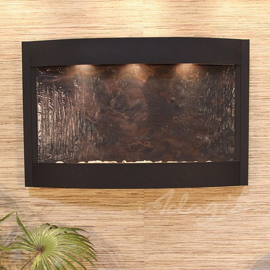 Image of a wall fountain with water flowing