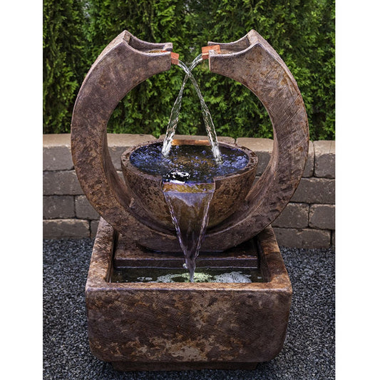 Image of a crescent shaped outdoor water feature with two water spills