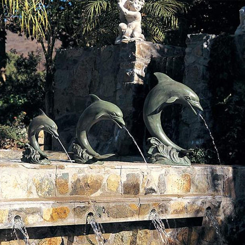 Large single dolphin garden or pool accent made of brass