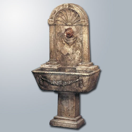 Outdoor water fountain with bronze spout