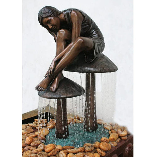 Brass Baron girl on mushroom garden accent statue