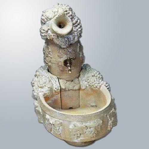 Outdoor water fountain featuring a grape harvest design, suitable for a spout.