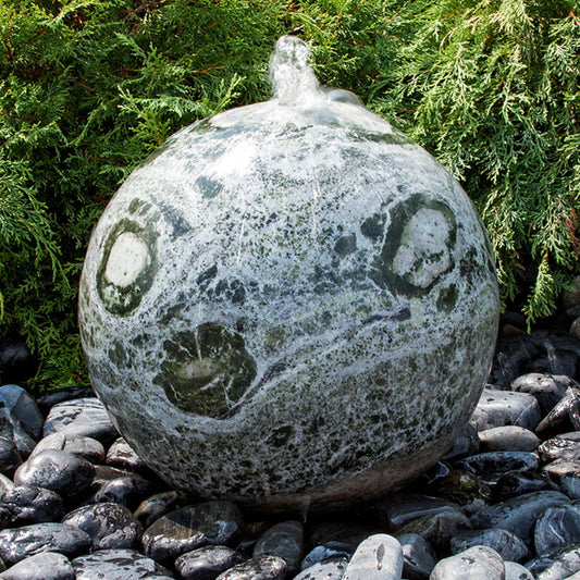 Image of a green marble sphere stone fountain