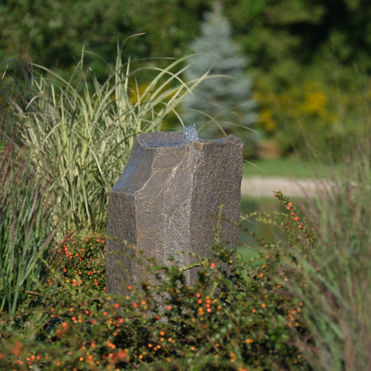 Garden rock fountain with hollow springs design