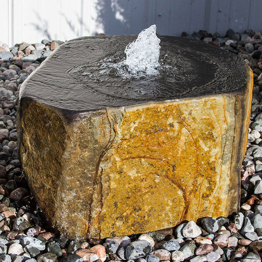 Stone outdoor fountain