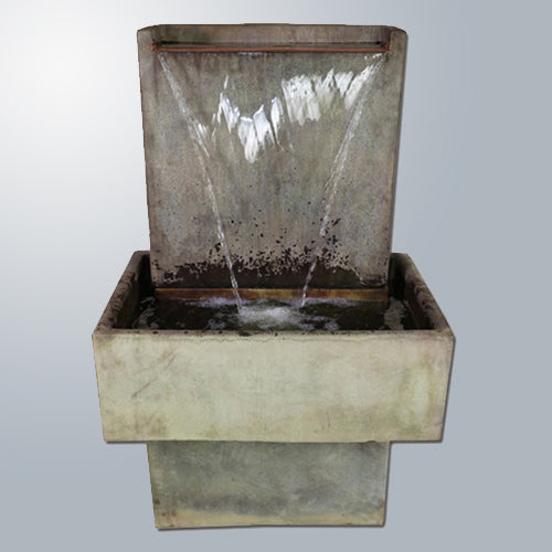Tall wall fountain with water flowing