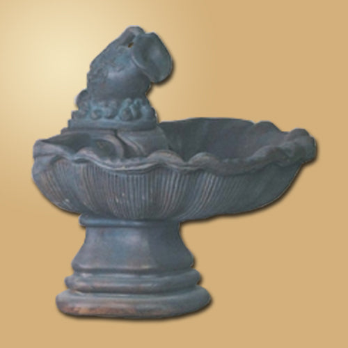 Large single tier shell fountain with water pitcher feature