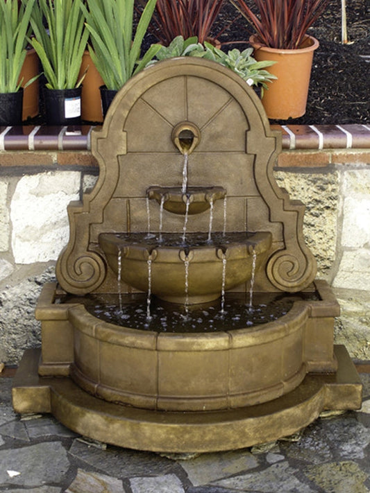 Wall water fountain with step and concrete spout