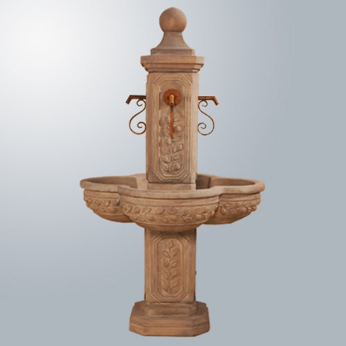 Courtyard fountain with rustic iron spouts