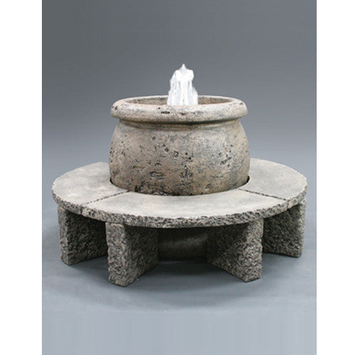 Cast stone fountain with granite benches
