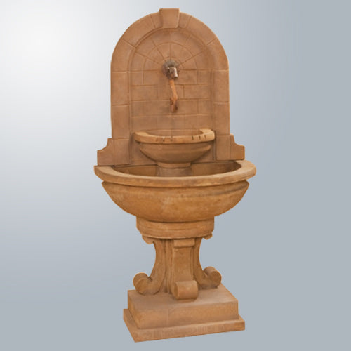 Wall fountain with rustic spout